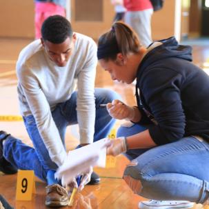 Criminal Justice students learn crime scene investigation techniques.