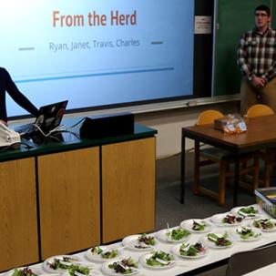 Ag business students give a presentation on a food product they created.