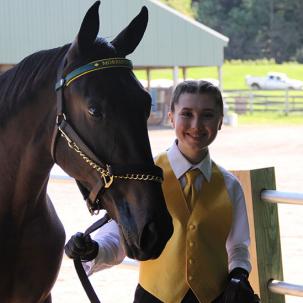 A student at the Standardbred yearling sale