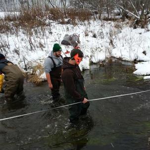 Environmental conservation students do field work.