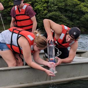 Environmental conservation students do field work.