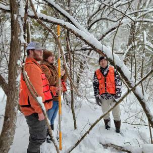 Environmental conservation students do field work.